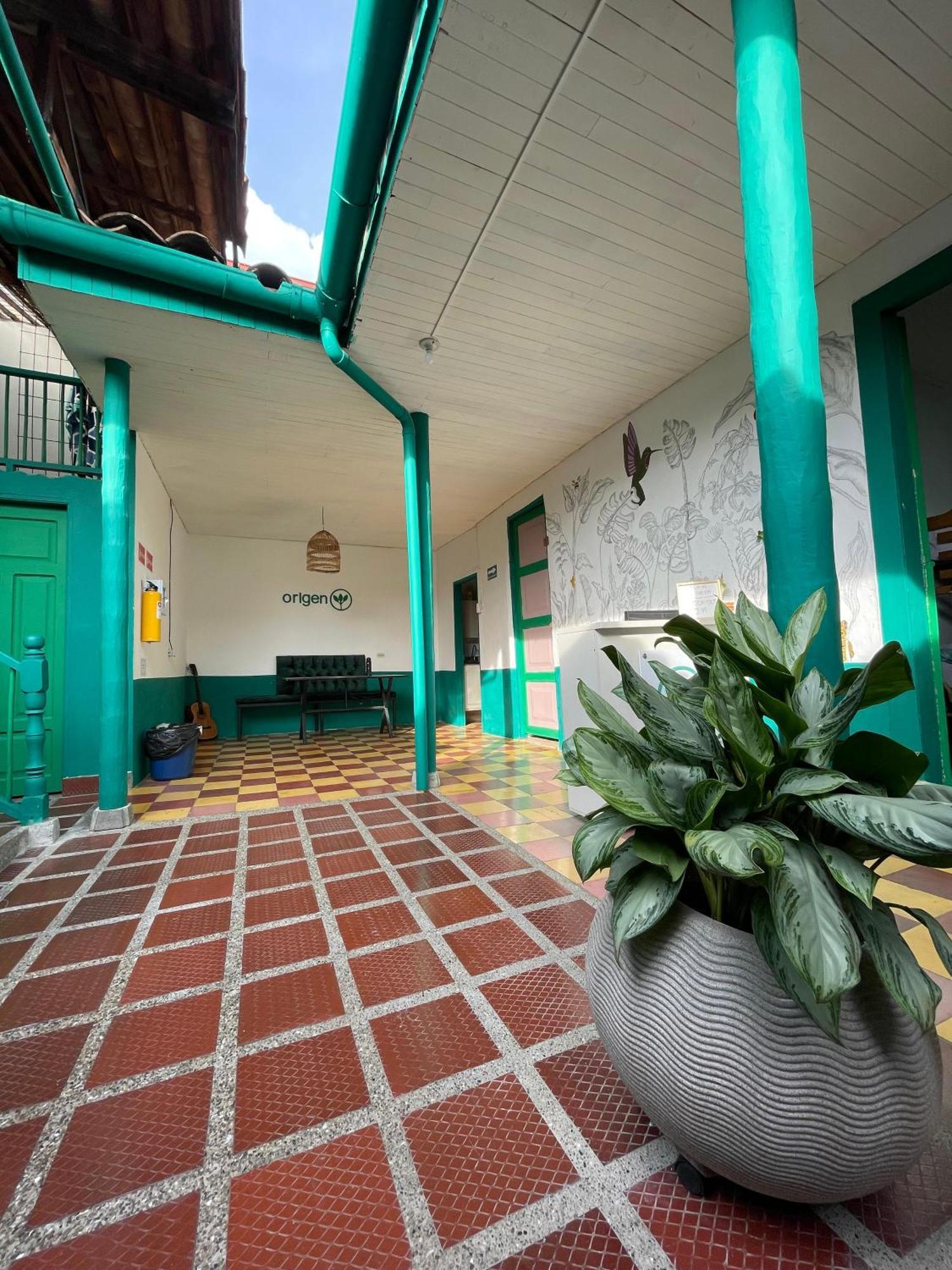 Origen Hostel Jardín Exterior foto